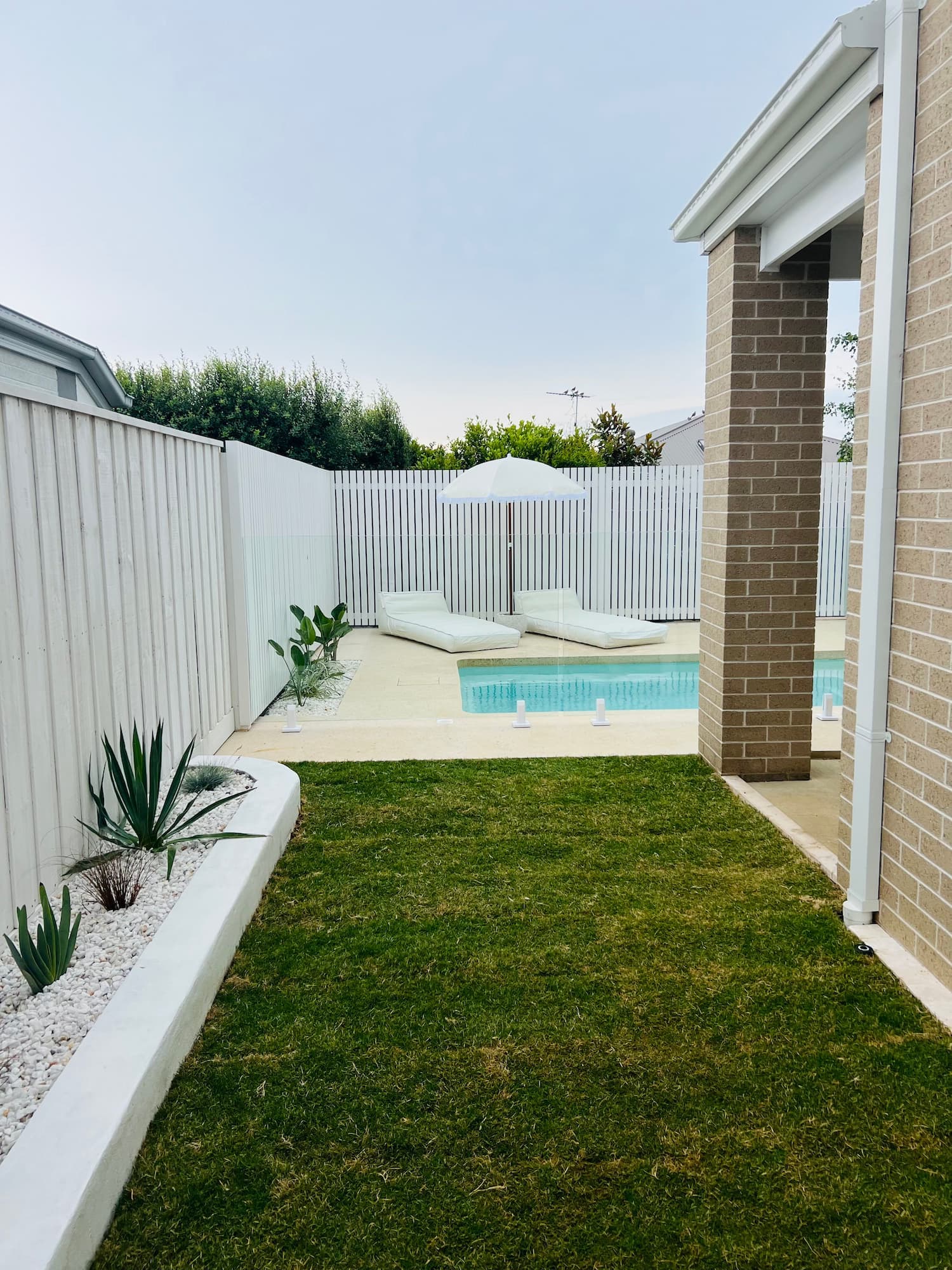 Pool surrounds and turf landscaped by KO. Landscapes